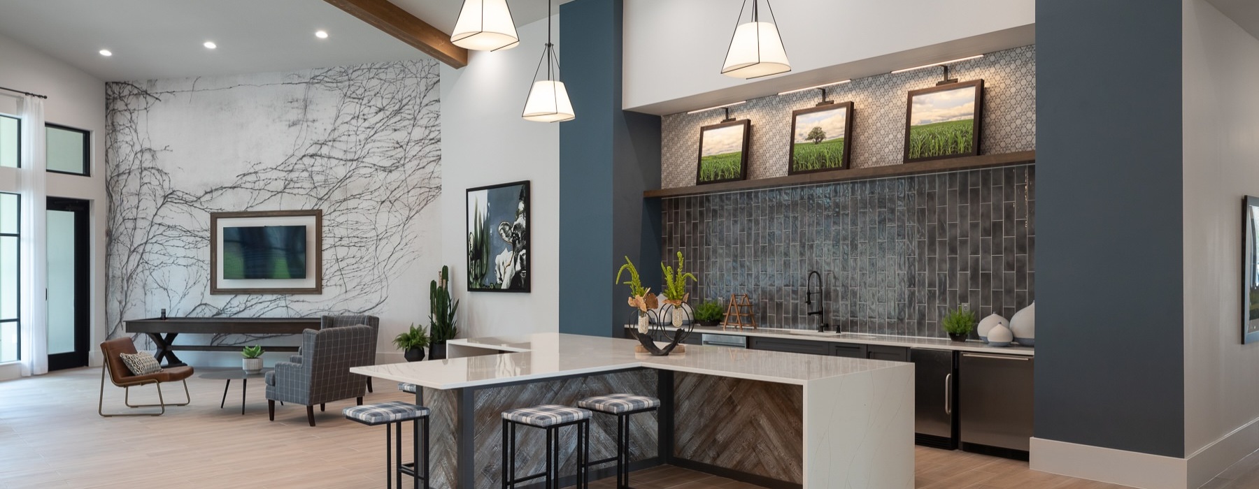 a kitchen with tables and chairs